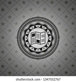 brochure icon inside dark emblem