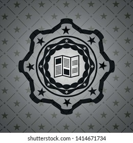 brochure icon inside dark emblem