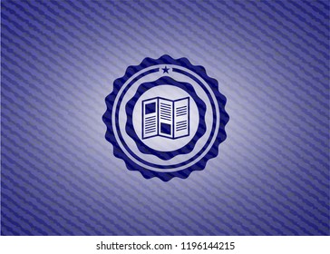 brochure icon inside denim background