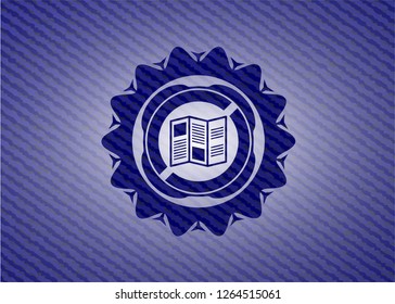 brochure icon inside emblem with denim high quality background