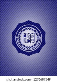 brochure icon inside emblem with denim texture