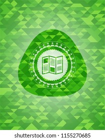 brochure icon inside green emblem with mosaic background