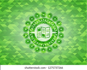 brochure icon inside green emblem with mosaic ecological style background