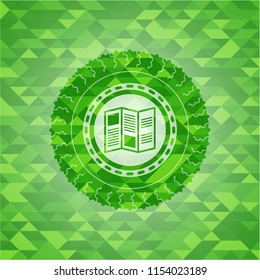 brochure icon inside green mosaic emblem