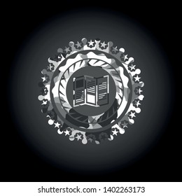 brochure icon inside grey camo emblem