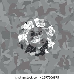 brochure icon inside grey camo emblem