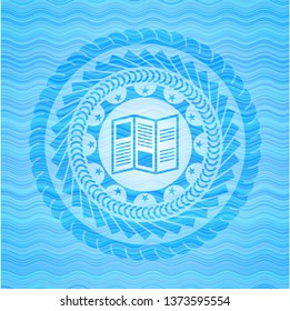 brochure icon inside light blue water wave emblem background.