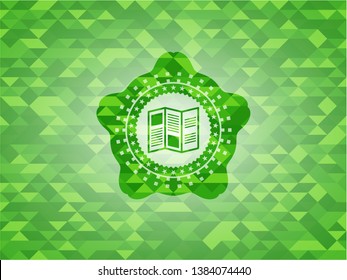 brochure icon inside realistic green emblem. Mosaic background