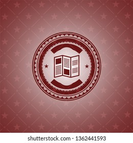 brochure icon inside red emblem