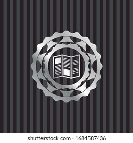 brochure icon inside silver badge or emblem