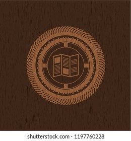 brochure icon inside vintage wooden emblem