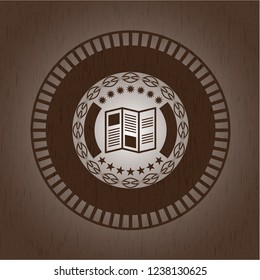 brochure icon inside vintage wooden emblem