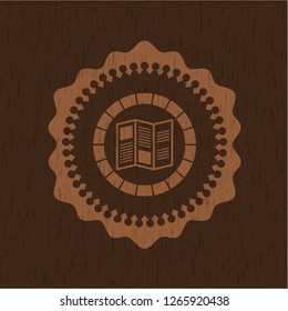 brochure icon inside wood badge or emblem