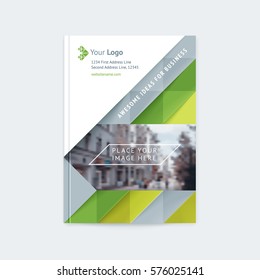 Brochure layout of the template cover design annual report, a magazine with a green and gray triangles and stripes, with logo and space for photo and text. Vector illustration of a modern flat style.