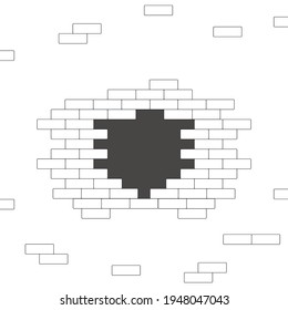 Muro de ladrillo roto con agujero.
