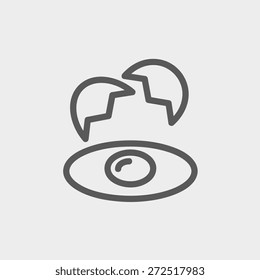 Broken egg with yolk icon thin line for web and mobile, modern minimalistic flat design. Vector dark grey icon on light grey background.