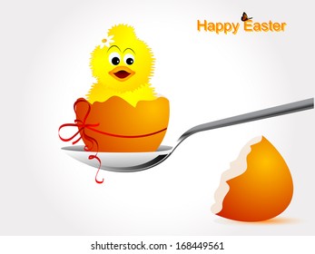 Broken eggshell with chick and orange ribbon