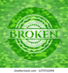 Broken green mosaic emblem