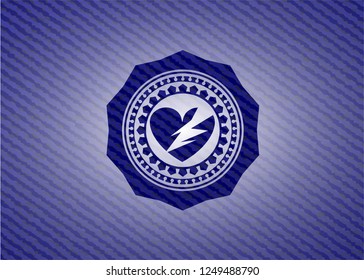 broken heart icon inside badge with jean texture