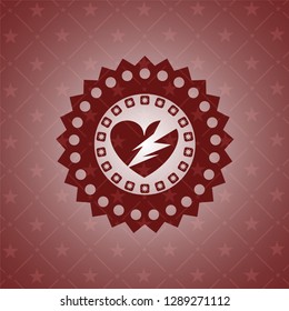 broken heart icon inside badge with red background
