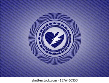 broken heart icon inside badge with jean texture