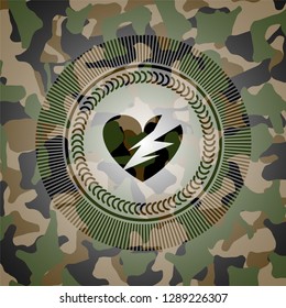 broken heart icon inside camouflaged emblem