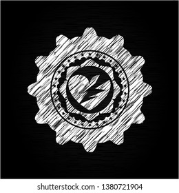broken heart icon inside chalk emblem