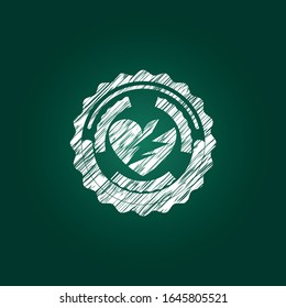 ícono de corazón roto dentro del emblema de tiza escrito en una pizarra