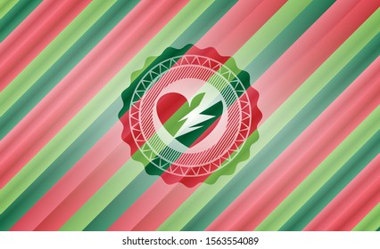 broken heart icon inside christmas badge.