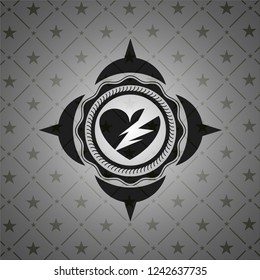 broken heart icon inside dark emblem