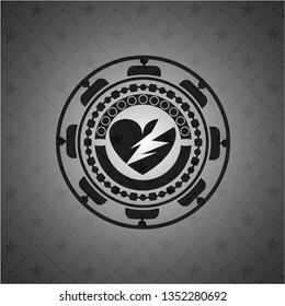 broken heart icon inside dark emblem