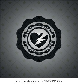 broken heart icon inside dark emblem