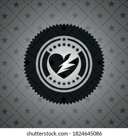 broken heart icon inside dark badge. 