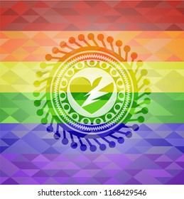 broken heart icon inside emblem on mosaic background with the colors of the LGBT flag