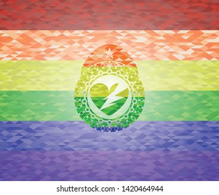 broken heart icon inside emblem on mosaic background with the colors of the LGBT flag