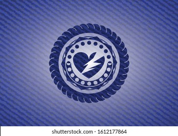 broken heart icon inside emblem with denim high quality background