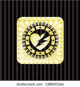 broken heart icon inside gold emblem