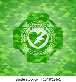 broken heart icon inside green emblem. Mosaic background