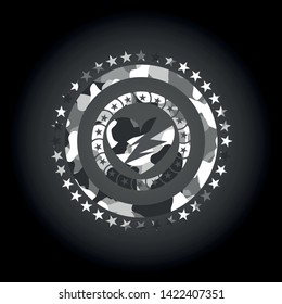 broken heart icon inside grey camo emblem