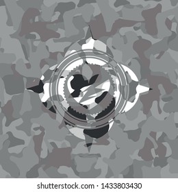 broken heart icon inside grey camouflage emblem