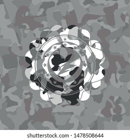 broken heart icon inside grey camouflage texture