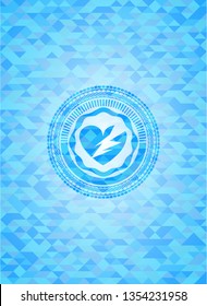 broken heart icon inside light blue mosaic emblem