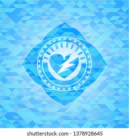 broken heart icon inside light blue emblem with mosaic background