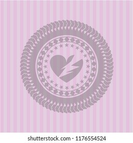 broken heart icon inside pink emblem