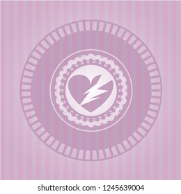 broken heart icon inside pink icon or emblem