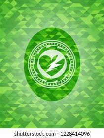 broken heart icon inside realistic green mosaic emblem