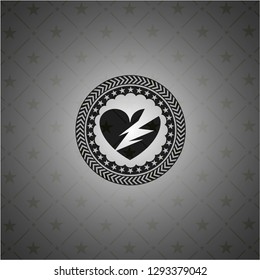 broken heart icon inside realistic black emblem