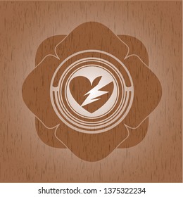 broken heart icon inside realistic wooden emblem