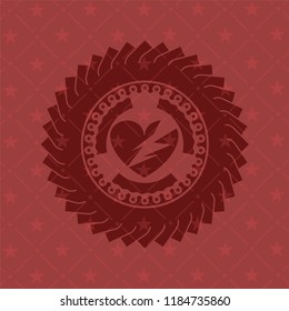 broken heart icon inside red emblem