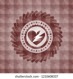 broken heart icon inside red seamless badge with geometric pattern.